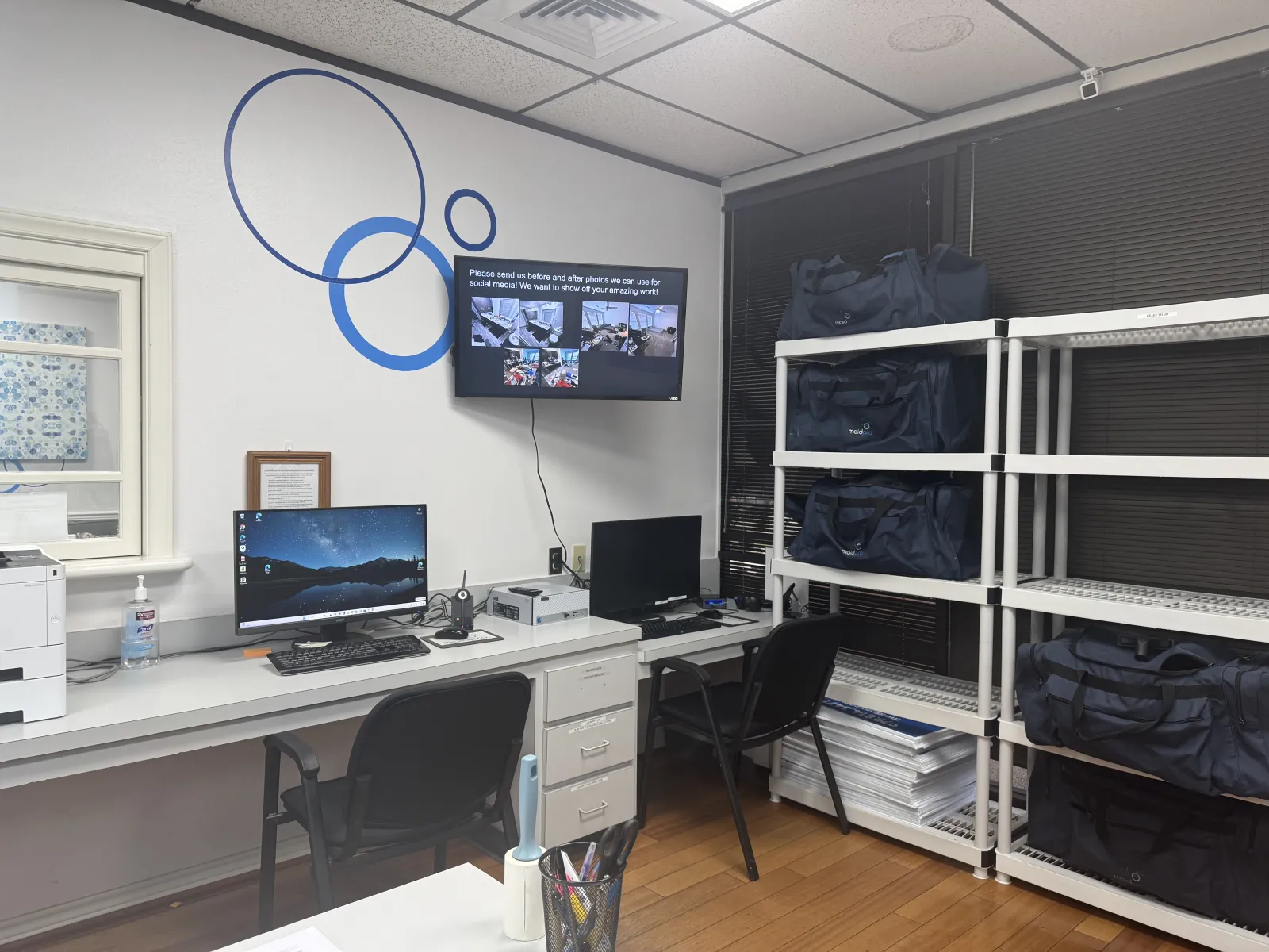 a room with a desk and a computer