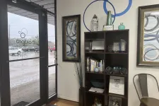 Thumbnail for a room with a book shelf and a window with a view of a street and cars