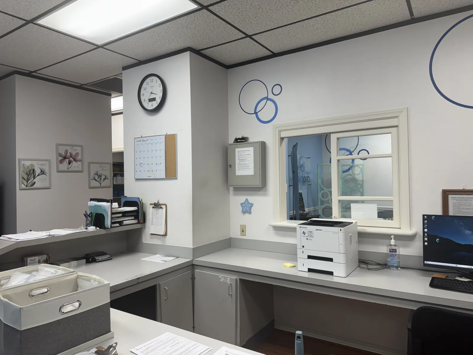 an office with a clock